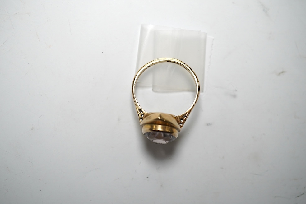 A modern 9ct gold and pale pink gem set ring, size R, gross weight 4.5 grams. Condition - poor